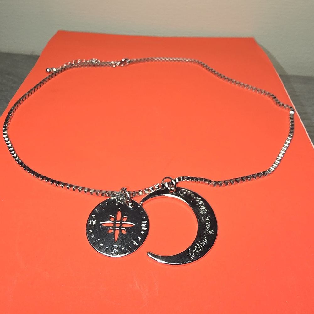 Silver Crescent Moon Necklace Engraved With "Follow Your Dreams" And A Compass